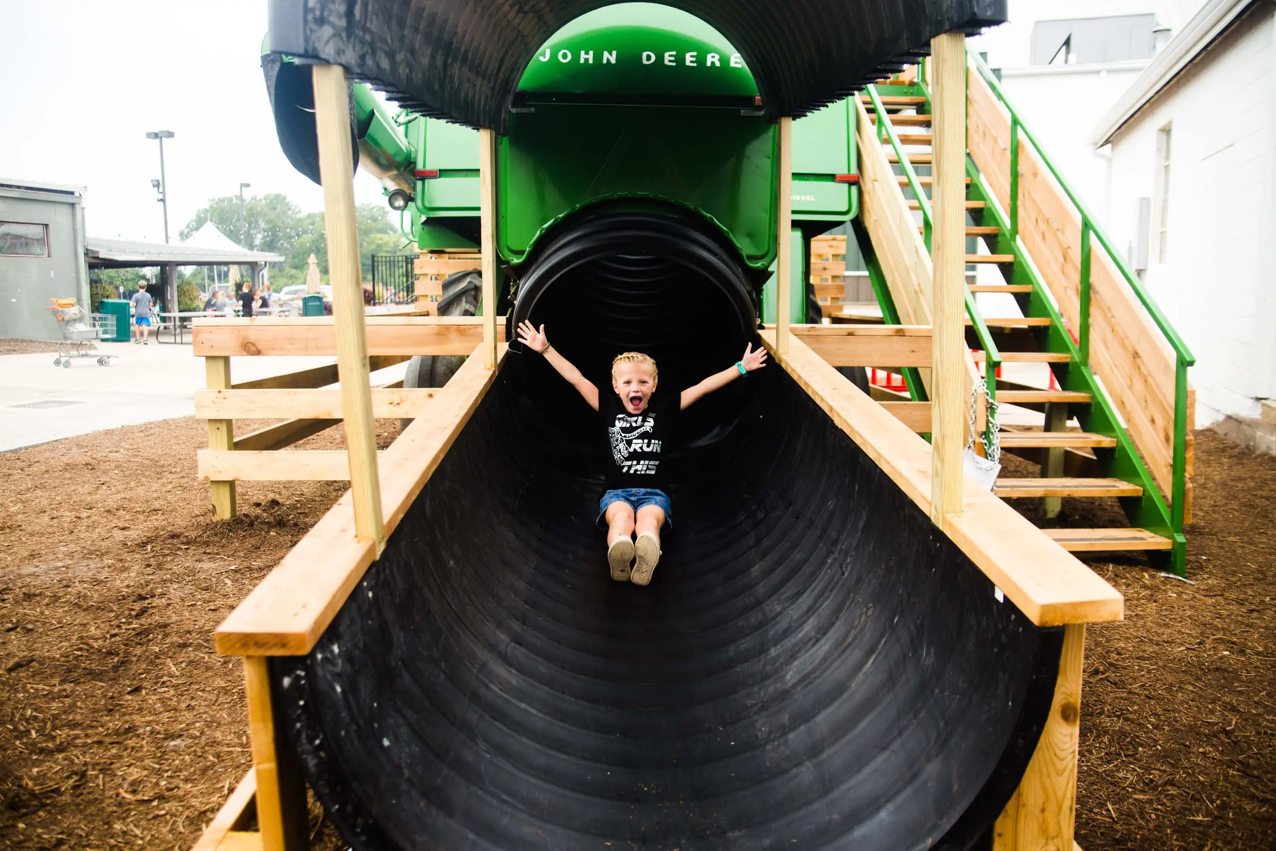 A picture of a child on combine slide.