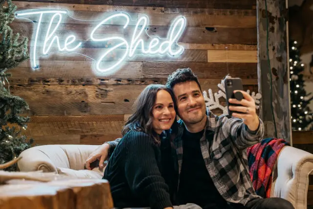 Cozy Shed picture of couple taking a selfie.