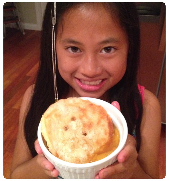 Girl Holding Mini Peach Cobbler
