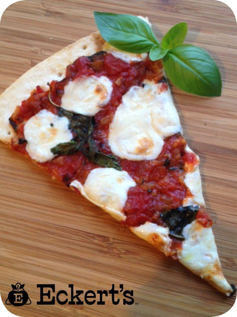 Slice of Margherita Pizza with Fresh Herbs